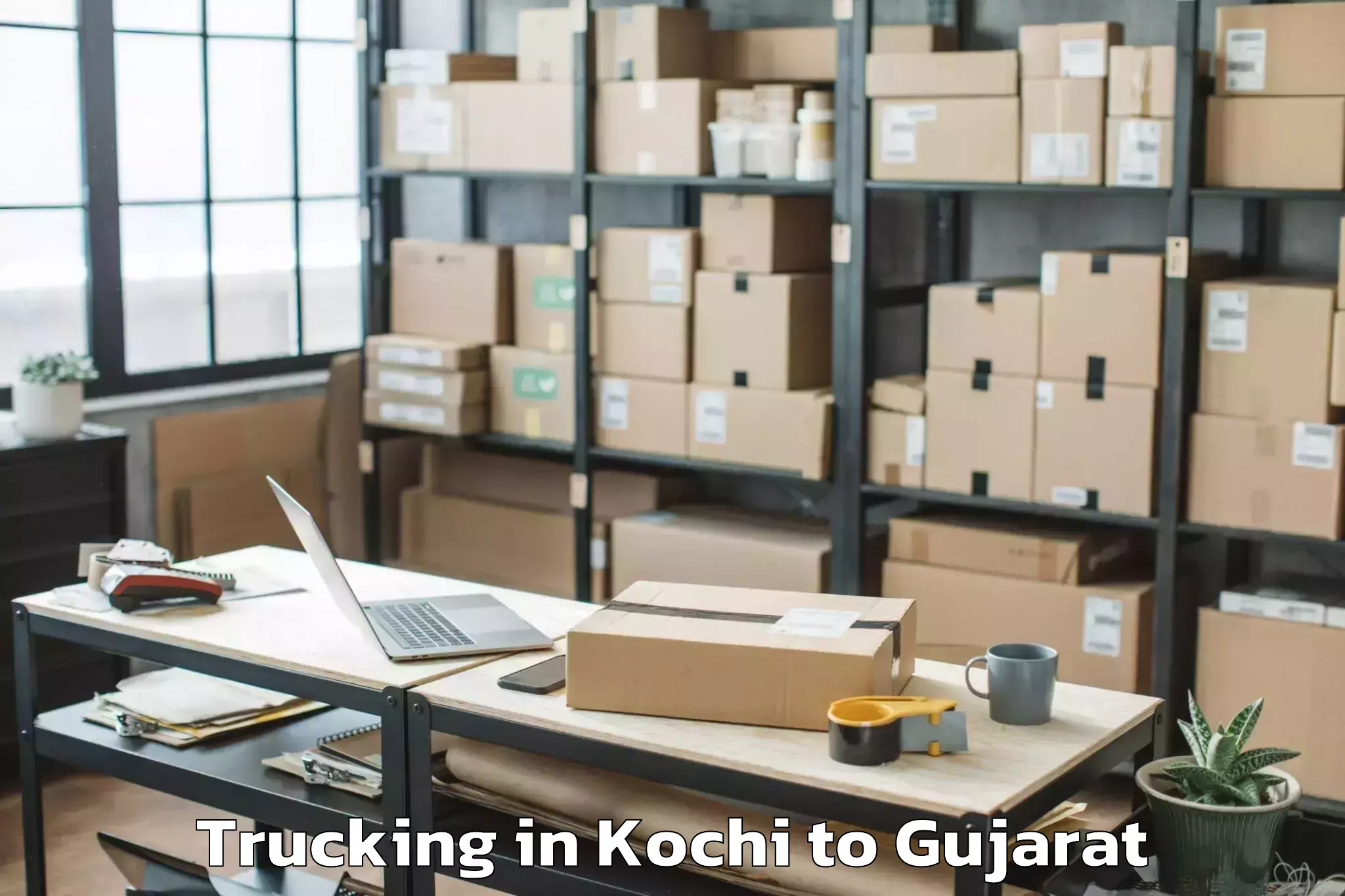 Reliable Kochi to Junagadh Trucking